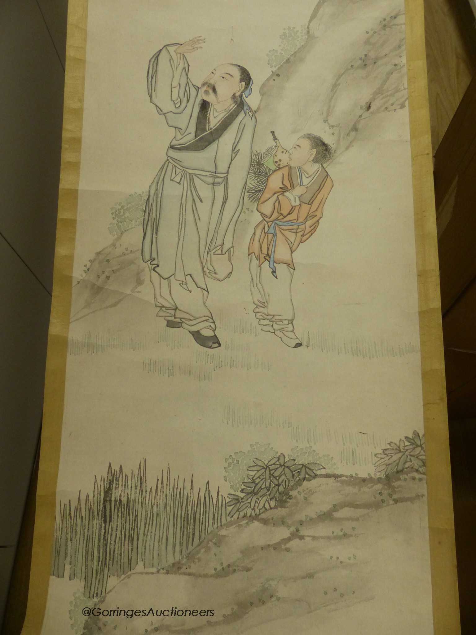 Two late 19th century Chinese scroll paintings, sage in a landscape and buildings in a landscape